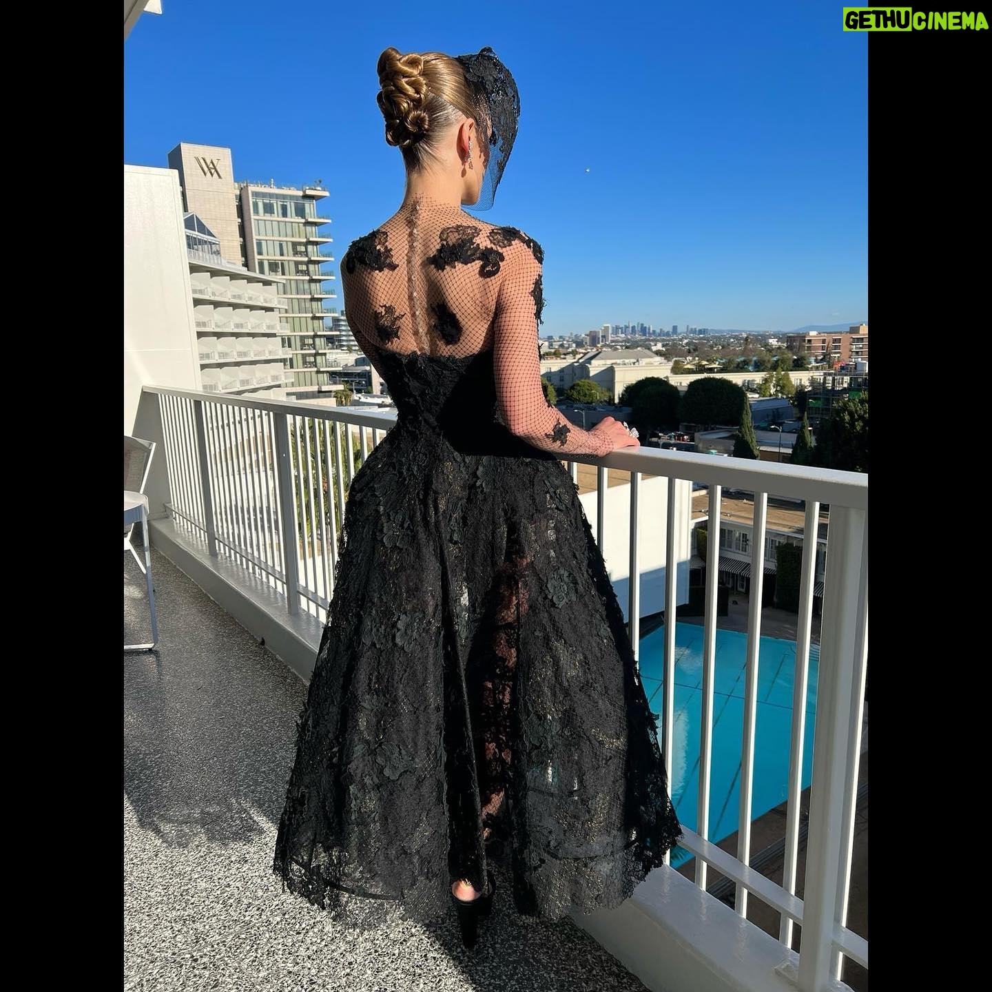 Rosamund Pike Instagram - This dress ! 2019 @dior Haute Couture by @mariagraziachiuri. The net chemise was remade for me by a relocated atelier brought here to LA from Paris… this dress is structured and soft, it floats and yet holds its shape. It is exquisite. Hair by my friend and collaborator @davidebarbieri_ inspired by the appliqué flowers on the dress and the chemise. Hat by the miraculous @philiptreacy who can float dreams and stories atop people’s heads. Makeup by @melaniemakeup complimenting the mystery of the veils. Styling by @leithclark We all spent the day feeling inspired and there was an air of enchantment . Thank you @prosper_pr for making it all so special.