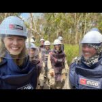 Rosamund Pike Instagram - In Battambang Province Cambodia, once again seeing with my own eyes the tireless efforts of teams of female deminers, working in swelteringly hot conditions protected by heavy, constrictive PPE, on uneven terrain. The undergrowth they have to clear to find the mines, remnants of wars over 30 years past, is dense, tangled and resistant. Many families live face to face with land still heavily contaminated with unexploded ordnance. The efforts of MAG are sensitive, expert, dedicated and inspiring. #proudambassador #landmines #cambodia