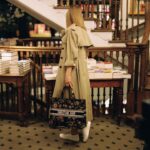 Rosamund Pike Instagram - Amidst the plethora of treasures discovered, one gem sparkled the brightest – the joy of being in a bookshop with no one around. As we bid farewell to the second edition of Book Tote Club, our House friend @MsPike carrying her #DiorBookTote by @MariaGraziaChiuri embraced the enriching experience of traveling the world while sitting still, in the presence of captivating company found within the realm of literature. © @MarionBerrin