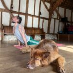 Russell Brand Instagram - Upward dog and... dozing dog Do yours ever join you for yoga? #Yogapose #Bear