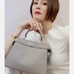 Ryoko Yonekura Instagram - 上品な見た目なのにシンプルで可愛いFENDIのアイコンバッグ『ピーカブー』 いくつあっても心が弾む❤️ この色も素敵！ #FendiPeekaboo #PR #Fendi @fendi FENDI icon bag “PEEKABOO” Although it looks elegant, it is simple, cool, and cute. No matter how many I have, my heart wii be excited！ This color is also nice！