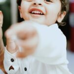 Sanjjanaa Instagram - Captured a few beautiful moments with @nivetha.photography as my baby turns 2 , god bless him and all the children ❤️ Sanjjanaa Galrani is wearing dress from @momzjoy .