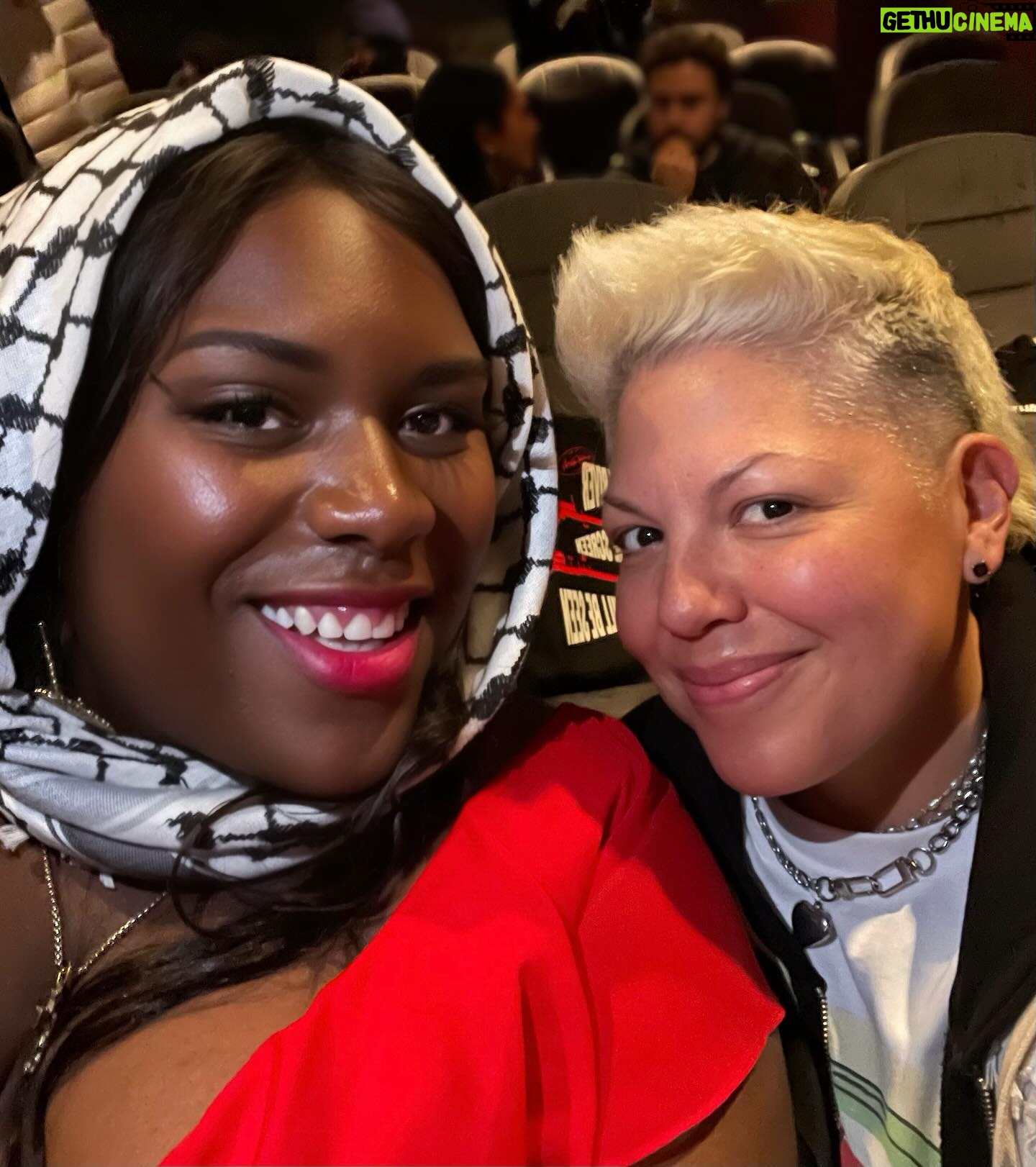 Sara Ramirez Instagram - Thank you @lanzybear and @watermelonpicturesco for welcoming us to this intimate screening of Walled Off; an incredibly powerful, moving, educational and galvanizing film by @vinarfuso , produced by @anwarhadid @rogerwaters @kwekumandela and Immortal Technique, that centers Palestinian humanity and stories over numbers, and shows the Palestinian perspective on how the ongoing Nakba continues today. Available on all digital platforms MAY 3rd. Spread the word! . . Pic1: @qween_jean and I in the screening room, smiling because it feels good to be with likeminded creative community. Video1: The beautiful flower and watermelon arrangement in the entrance to the screening room, a poster of Watermelon Pictures on the left of the arrangement and to the right is a poster of Walled Off. Pic2: wide pic of the above. Video2: panning the entrance to the screening room, all the beautiful creative community in support of this film and Watermelon Pictures. Video3: selfie video of Qween and I with screening entrance room and community in the background, exclaiming “Solidarity!” “Watermelon Pictures!” “FREE PALESTINE” with Alana’s sister joining us toward the end. Pic3: my hand holding up a black Watermelon Pics swag bag that reads “FROM THE RIVER TO THE SCREEN PALESTINE WILL BE SEEN” (obsessed) in English and Arabic, English in white, Arabic in red. Video4: @munir_atalla who is part of the @watermelonpicturesco team, welcoming us inside the screening room and asking who here is Palestinian. The crowd erupts in a loud “WOOO”. Then he says “For all of you who didn’t go ‘wooo’, you are wrong because if you were invited here you are a part of our movement. In our thousands in our millions, we are all Palestinians. And so let’s hear it one more time- Who here is Palestinian?” Everyone erupts in an even louder “WOOO!”. Then Qween exclaims “Viva Viva Palestina!” The crowd laughs and enjoys it! Munir says “Yes.” Pic4: @lanzybear and Walled Off filmmaker @vinarfuso sitting at the front of the room in a talk back with the audience. So so powerful and appreciated! . They tried to bury us. They didn’t know we were seeds. 🌱🍉❤️🔥
