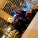 Sara Ramirez Instagram - Thank you to community for keeping one another safe, and affirming the world we know is possible. It’s nights like this one that keep me going. What a time to be alive. . . 2 pics of the same group selfie taken by Sagan inside a restaurant, with NYC through the windows looking out behind us: 1st one is from further away with Qween, Sawyer, Sagan, me, Sloane, Ianne and Crayton in various forms of smile and love energy, the 2nd pic is a close up of the same group similar vibes.