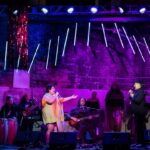 Sara Ramirez Instagram - The first time I experienced Las Mariquitas- New York City’s only queer & trans salsa band- I recall their warm, electric, spirit & sounds magnetizing me into the room. The space was packed, the crowd was very inclusive. Bodies of all shapes & colors could not help but undulate to the vibrations of our ancestors/trancestors. From slow romantic tunes to fiery fast paced rhythms, Las Mariquitas has an uncanny ability to lay out a musical tapestry of pain, joy, & everything in between. I could sense the band was (and is) not only made up of some of the most beautiful, talented, queer people I’ve ever met, but unified for something more expansive than that space could contain. And there we all were, moving, singing & forcing the walls to contend with our unification through the music of Las Mariquitas. We danced, we sang, we connected. At one point Las Mariquitas descended from the stage into the crowd & opened the floor up for us to root each other on in our collective liberation. I knew in this moment I would be transformed forever. When Las Mariquitas plays, it’s not just for entertainment, it’s not just about the tight & vibrant sets they perform, it is - additionally- about power of the people & of Mother Nature. The space they inhabit is welcome to all. Las Mariquitas has, with their spellbinding & soaring melodies, arrangements, vocals & lyrics, touched my soul & I am forever changed & grateful. Do yourselves a favor:learn what it is to experience Las Mariquitas live. This is an invitation for you to savor the delicious taste of liberation through the power of salsa & Las Mariquitas band.  Pic 1: multicolored poster, with green lady bugs that reads “Feb.22.2024, Mariquitaverse, ft. Duendita, MiraMira, Gladstone Deluxe, 3 Dollar Bill, Doors 7pm, Showtime 7:30pm-3am, 260 Meserole St., Brooklyn, NY, Las Mariquitas” . Pic 2: Sara & @mariquitas.band @breakingthebinarytheatre’s Bliss in 2023 . Video1/2/3: Feb 17,2023. My first time @mariquitas.band @cmoneverybodybk with @qween_jean @trudy0nduty @blacktransliberation @adrianavergaraa @lola.machine Video3/4: Sept 22,2023 @mariquitas.band @qween_jean joins the band @cmoneverybodybk 🎥: @trudy0nduty