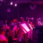 Sara Ramirez Instagram - 2.17.23 @cmoneverybodybk 🏳️‍🌈 @mariquitas.band 🏳️‍⚧️✊🏽🎶 This is what community looks like. This is what liberation looks like. . . Videos: a rainbow of Black Brown Asian and white Queer and Trans people sharing space with each other in @cmoneverybodybk while holding space for the humanity, message, heart, talent, energy, and presence @mariquitas.band , a tgnc (trans and gender-non conforming) salsa band, brought last night. We danced the night away and freed ourselves. At some point Qween and co. inspired me to jump in and get free so I did. The last video is what happens when the set is over and you make your own music with each other. It was so joyful and generative to share space in an inclusive lgbtqia culture that is for true liberation. Thank you @mariquitas.band for all that you are and all that you are building. @qween_jean @trudy0nduty @ohhbrent 🕺🏽💃🏾🎉♥️