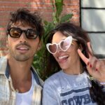 Sarah Shahi Instagram - I can’t post any pics from the movie, so here are @taylorzakharperez and I discussing top secret PR strategies. So very proud to be in this film. We’ll knock your socks off, that’s for sure. Love is a fickle bitch. ( and go @dallascowboys 🏈) @rwrbonprime @matthewmichaellopez @sarahsowitty @mimbomike @jennifersalke addoorrreee you