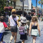Sarah Shahi Instagram - We beat Bowzer, escaped the clutches of kong, chased off a T-rex, and lived to tell the tale. Thx for an awesome day for my littles and me @unistudios ❤️