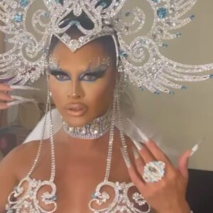 Sasha Colby Instagram - one more moment of appreciation for the garment💎🩵 

thank you to the team for making the step down look of my dreams possible! 

📸 @sanchezzalba
Makeup @prestonmakeup
Gown @ethan.m.cross @shontellesparkles 
Headpiece @fiercejewels_official
Hair @_hairwitch Nails @sonyameesh