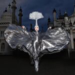 Sasha Velour Instagram - The Brighton Dome windows have never been cleaner thanks to very special guest @misterjoeblack 🧼🪟🖤 You have three more chances to catch The Big Reveal Live Show in the UK before we make our way to Europe next week! Photos in front of the @royalpaviliongardens by @mettieostrowski Headpiece by @diegomontoyastudio Garment by @jazzmint.dash
