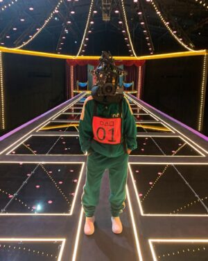 Shaina West Instagram - Imagine playing a game and dying. Could never be me. 

It was pretty cool playing and winning all the games while wearing a giant camera on my head and still coming out totally unscathed. #bosslevel 

#SquidGame the reality show is out now on Netflix and it’s very entertaining. 😌