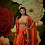 Sharanya Turadi Instagram – @sharanyaturadi_official  X  Mokshaa

Step into the wedding venue like a regal vision in this exquisite ensemble! 

Picture yourself adorned in a stunning draped Indian wear skirt, intricately embellished with shimmering gold zari embroidery, perfectly complemented by a resplendent blouse. 
But wait, the elegance doesn’t end there, a graceful kaftan overlay adds a touch of sophistication.

Shot by – @rahul__sudharshan 
Make up & Hair – @jancymakeoverandhairdo 

#weddingseason #summervibes #celebration #comfort #craftsmanship #drapedskirt #kaftanoverlay #brickorange #indianfashion #traditionalwear #ethnicwear #mokshaachennai