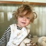 Sharna Burgess Instagram - Morning hairs 🤍 Every morning I video coming into his room and it’s the most beautiful moment. Sometimes I share it on my stories when it’s just too cute not to. But I don’t do it with the intention of sharing. I video every morning because these moments I know won’t last forever and I want to immortalize as many of them as I can. The first time he sees me or sees the kids coming in to say good morning his little face lights up. His hair is ALWAYS wild and his little button nose is always a touch pink. Sometimes when daddy doesn’t take out his top knot he wakes up like Lucy Lou Who from the Grinch. 😂 his sweet little voice saying Hi as he waves. I can never ever get enough. Wake ups and bedtimes are without doubt my favorite times of day. Bedtime I sing or hum for him, I speak positive affirmations to him, remind him how loved and safe he is and I thank him for choosing me. For making me a mama. Motherhood. My greatest, most favorite and coolest thing I’ve done yet. And I’ve done some pretty cool things :)