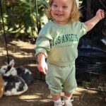 Sharna Burgess Instagram - I. Can’t. Handle it. He’s a little boy. I blinked and it happened 🥹 so big, so loving gentle curious kind … and opinionated lol. It’s ok because every stage and phase continues to get better and better. My mum keeps reminding me that these first 5-6 years were the favorite of her life and I get it. All the discoveries and learning and growing and stumbling and snuggling are the best feeling ever. One day, as many of you mama’s have shared with me… I’ll give anything to relive just a minute of these moments. 🤍 Celebrating our family yesterday ✨ Dakota Rhye is 1!!! We love you guys so freaking much ♥️ Cutest outfit is @minioliestore link in my stories 🫶🏼
