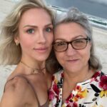 Sharna Burgess Instagram - My beautiful Mama, every year I try and find new words that might better describe how much I love you and appreciate you but truthfully.. it’s impossible. How could I minimize what you mean to me, what you have given me, taught me, shown me and sacrificed for me into just words? I can’t, words will never do it justice. But I’ll always try :) 2 years ago you left the life and tribe you’d built in Australia for me and a family you had met only once in a country foreign to your own. You did it at my request (demand..) with no resistance. You packed up 68 years of life and memories for a new beginning and no real plan laid out. I cannot imagine how terrifying that was. How insanely overwhelming and stressful it was. I know it took time to find your way here, to find yourself here, and I know you protected me from the worst of your struggles and grief. But regardless I could see it. I can always see you. Thank you ♥️ Now I see you thriving in this role of Grandmother and it seems to have aged you backwards. You’ve found “play” again and I think purpose too. Everyone who meets you loves you and your warmth and energy is something that draws people into your orbit, often those who need a little help and guidance. Watching you embrace and embody this new chapter reminds me daily how unbelievably lucky I am that you are my mother. The example you showed me and the bar you set is what has made me the mother that I am. I wouldn’t be me without you. I love you beyond measure and words. Happy Mother’s Day my Woo ♥️ We are all so lucky and grateful you’re here with us. And sending so much love to all the different types of Mothers in all the different stages of motherhood. And of course to those whose Mamas are shining down on them from afar. 🤍