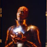 Shea Couleé Instagram - I’m this month’s cover star for @totem_magazine 🤩 Had such a great time working on this editorial with such a brilliant team. The concept was A.I. Joan Of Arc. We wanted to juxtapose this historical figure with the ongoing developments of A.I. and the way it is perceived by society as a whole. Like most polarizing things, it’s often good until someone decides that it a problem. Similarly to the ongoing threats waged against drag in America. Check out the link in my story to read the full article! Creative Director, Photographer & Light Artist @eivindhansen Styling & Costume Design @juicylames @agrostudio_ Set Design @mariashrigley Hair @sheacoulee Makeup @candy_puxe Director of Photography (DOP) @vlad_jako  1st Assistant Director @marietheresehildenbrandt Photographer Assistant @selinejoh Set Assistant nyk_mensah Makeup Assistant @mistraty Styling Assistants @kaydmfreud @daniellenevin Talent assistant @brendon_brown_ Nail @brixton_klaws Nails @bbygirlnails Lighting Sponsored by Nanlite UK - @Nanlite_UK Studio: @interlude.london The Avatar ● Dress: Maximilian Raynor - @maximilianraynor The Cleric ● Dress: Zhujing（Deni) Dai - @zjingdai_deni ● Corset: AGRO STUDIO - @agrostudio_ ● Hat: Hat & Spicy - @hat.n.spicy ● Armour: Costume Studio - costume_studio_london ● Shoes: Maximilian Raynor - @maximilianraynor The Sorceress ● Feather Headpiece: Vivienne Lake - @viviennelake_ ● Jewellery: Amy Rodriguez - @amy____rodriguez ● Boots: Lucy James @juicylames ● Dress: Daiana Ion - ddainaa_ ● Top: Louise Webber - @louisewebber.design The Pyromancer ● Top: Paul Aaron - @paulaaronknitwear ● Skirt: Lucy James @juicylames ● Jewellery: Baba Roga Jewellery - @babarogastore