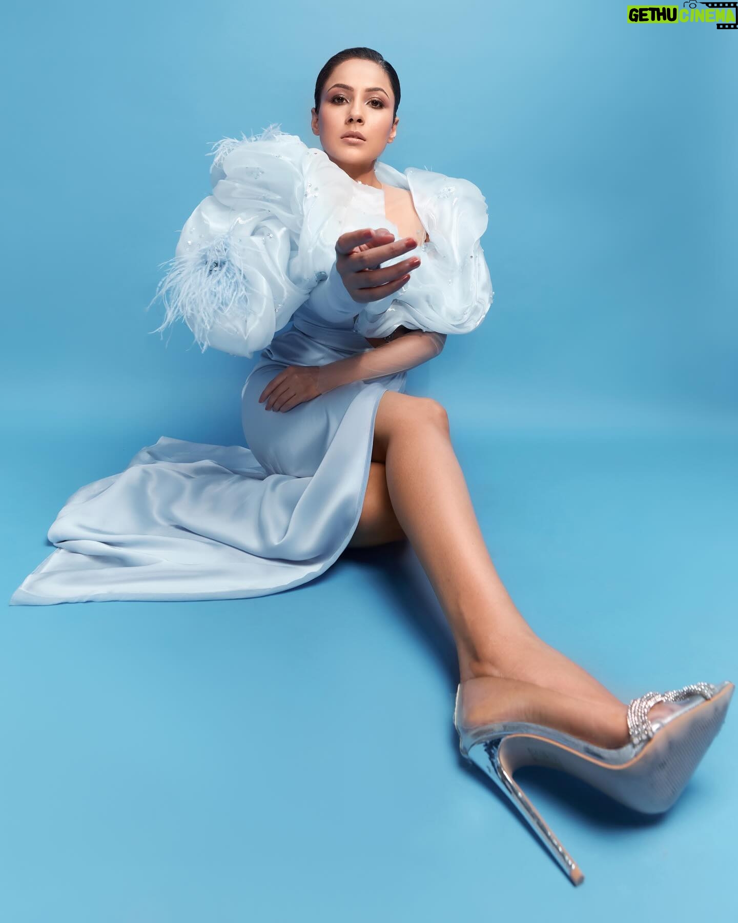 Shehnaaz Kaur Gill Instagram - Redefining beauty, one fierce pose at a time. Outfit by @hindzeidanofficial Heels by @publicdesire Styled by @manekaharisinghani with @chintan_shah08 Makeup by @reshmaamerchant Hair by @cheemabaljit2 Shot by @priyankknandwana