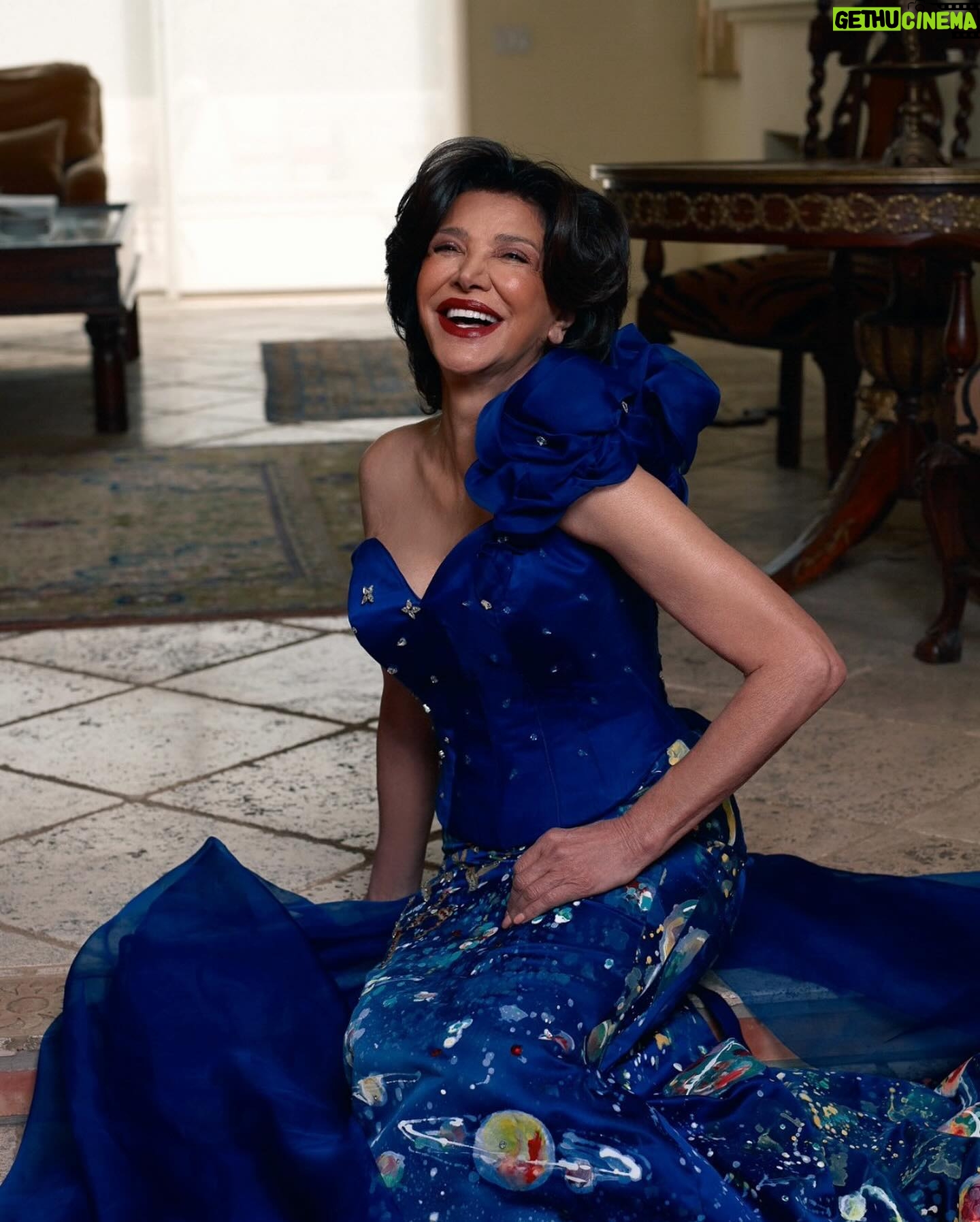 Shohreh Aghdashloo Instagram - Thrilled to share a glimpse into my latest feature with Javanan magazine, where fashion meets activism. For years, I’ve had the honor of collaborating with the incredibly talented Iranian-American designer, @shahladorriz. This time, I approached her with a unique request: to craft a dress that embodies a critical message for our times - ‘Global Warming Is Real’. The result? A masterpiece that speaks volumes. Dive into the full interview on the Javanan website to discover the story behind this powerful statement piece. خوشحالم که گفتگوی نوروزی ام با مجله جوانان را به اشتراک بگذارم، جایی که مد با فعالیتهای اجتماعی دیدار میکند. سال ها است که افتخار همکاری با طراح ایرانی-آمریکایی بسیار هنرمند و با استعداد، شهلا دوریز، را داشته ام. این بار، با یک درخواست منحصر به فرد به نزدش رفتم. طراحی یک لباس که پیامی حیاتی برای دوران ما را در بر بگیرد - ‘گرمایش جهانی واقعیت دارد’. نتیجه؟ اثری شاهکار که حرفهای زیادی برای گفتن دارد. برای خواندن داستان این لباس و گفتگو میتوانید به وبسایت مجله جوانان سر بزنید و مصاحبه کامل را مطالعه کنید. 📷: @DaeHowerton