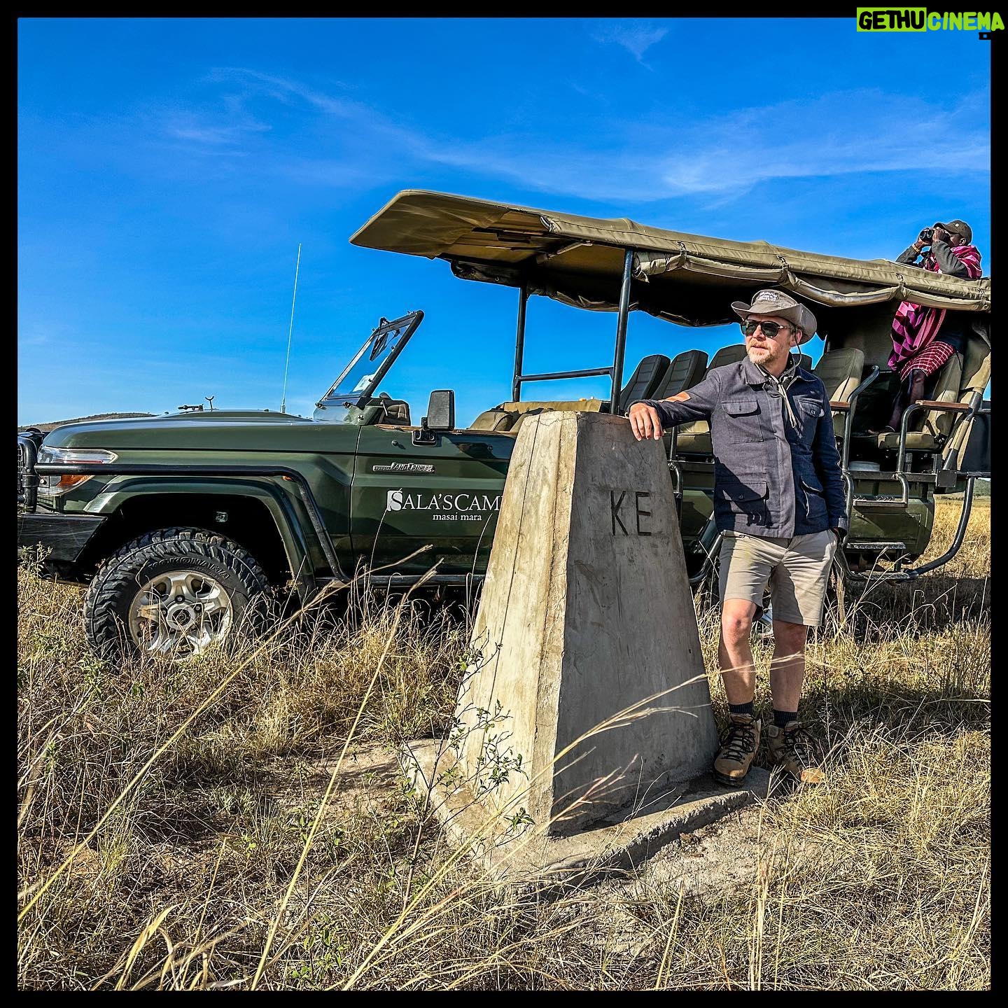 Simon Pegg Instagram - Absolutely not posing on the Kenyan/Tanzanian border, where the Masai meets the Serengeti. Straight up bucket listing. ❤️🦁