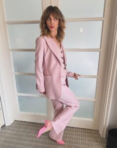 Sophia di Martino Instagram - One rainy weekend in the city of angels 💜 Make up @gregoryarlt Hair @nikkiprovidence Skin @dimpleamani Styling @karenclarkson Dress @isseymiyakeofficial Suit @bella_freud Shoes @louboutinworld