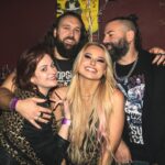Sophie Lloyd Instagram - Genuinely can’t remember the last time I smiled so much 🥹 Thankyou everyone for making this album launch so special, I look so deliriously happy in all of these photos and thats because I was!! this launch party really was one of the best nights of my life, 3 years of hard word finally paid off 🖤 I’m so beyond grateful for everyone and everything that bought me to this point where I can finally say … Imposter Syndrome is available to stream worldwide NOW 🥹 📷 @cameronbeedie #impostersyndrome #albumlaunch #sophielloyd #sophieguitar #albumparty #party #newmusic #rockmusic #outside #gang #slimjims #tattoo