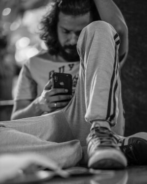 Sreenath Bhasi Instagram - Always on the phone. Thank you @arunkiranam for the pic.