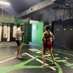Stephanie Bell Instagram - Can’t wait to get back into the LAB! @fightlabfitness @_noahjfitness_ #MuayThai #Kickboxing #WWE #Fighlab