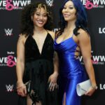 Stephanie Bell Instagram - Sister, sister Talk about a two-way twister Shaking up the family tree With sibling synchronicity #WWE #LoveAndWWE #YimSisters