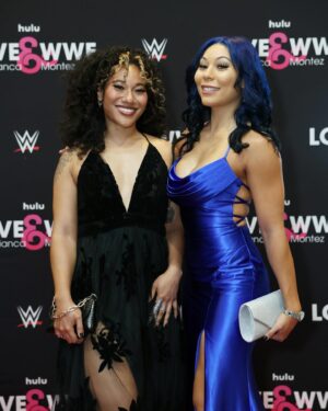 Stephanie Bell Instagram - Sister, sister
Talk about a two-way twister
Shaking up the family tree
With sibling synchronicity

#WWE #LoveAndWWE #YimSisters
