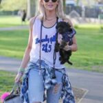Stephanie Pratt Instagram - Happy New Year!!!! And Happy 6th Birthday to my little noodle head named Max ❤️🐶 he’s the best boy I’ve met from Essex 😂. My best friend and my favorite travel buddy ❤️ he’s with me literally every second and has been on about 40 flights with me in the past 7 years & He has permanent shotgun in my car 🚗. If I’m not his pillow, he’s mine for every nap and night. He is the greatest gift everyday. ❤️❤️❤️❤️❤️❤️❤️❤️ you guys noticed his tag says Henry… when I filed his paperwork I chose the name Henry, but when I brought him home… he seemed much more like a “Max.” I actually named him after “Max Burger” in Sweden- bc it was the best burger 🍔 I’ve ever had 😂🤣😂. So officially on his passport is Max Henry 😂🥰