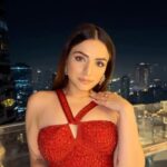 Sukriti Kakar Instagram - A moment in red ❤️ Outfit : @essrubypunitadua Jewels: @amrapalijewels Bag : @aclutchstory Styling : @aashnarekhi @chandnikhanna