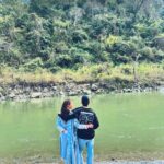 Surbhi Chandna Instagram - There is soo much beauty in Uttarakhand that its unreal Husband & I went on a getaway to Jim Corbett right after our wedding , the sweetest folks of @paatlidun.safari.lodge hosted us at their luxurious property and the experience has been surreal Seen here relishing our High Tea at the Kosi River and were fortunate enough to spot a Sambar Deer & few endangered Birds while we sipped on coffee made by @karanrsharma09 🤎 What an experience Enjoyed the property’s organic produce in the form of Kumaoni thali Also i have been super excited through this trip cause karan loves Safari and i haven’t experienced it ever The weather was Bomb wish we could stay longer 😍 Visiting you’ll super soon Wearing @shopmulmul