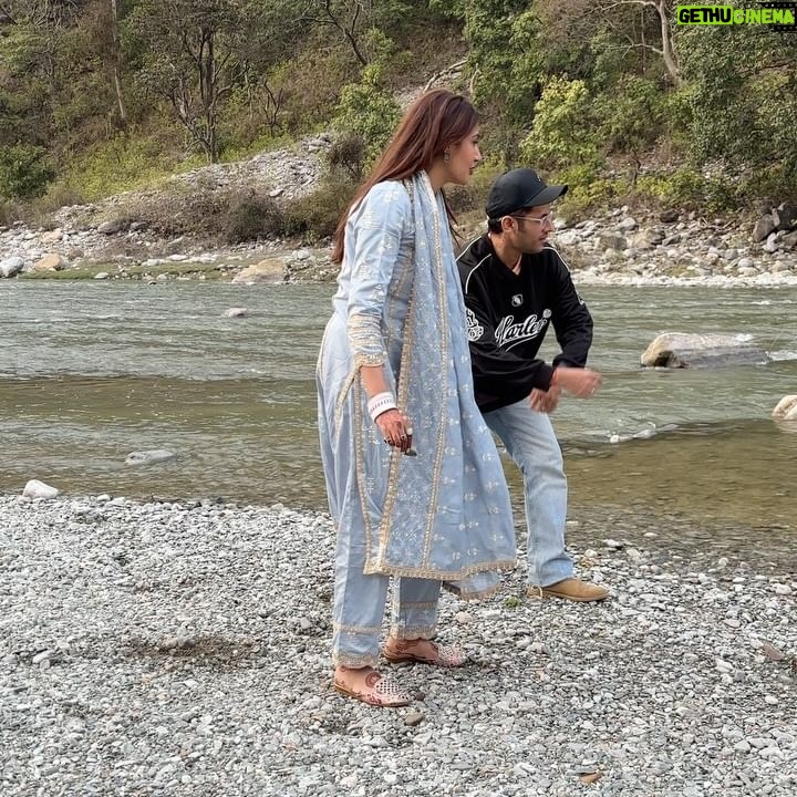 Surbhi Chandna Instagram - There is soo much beauty in Uttarakhand that its unreal Husband & I went on a getaway to Jim Corbett right after our wedding , the sweetest folks of @paatlidun.safari.lodge hosted us at their luxurious property and the experience has been surreal Seen here relishing our High Tea at the Kosi River and were fortunate enough to spot a Sambar Deer & few endangered Birds while we sipped on coffee made by @karanrsharma09 đ¤ What an experience Enjoyed the propertyâs organic produce in the form of Kumaoni thali Also i have been super excited through this trip cause karan loves Safari and i havenât experienced it ever The weather was Bomb wish we could stay longer đ Visiting youâll super soon Wearing @shopmulmul