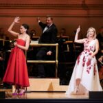 Sutton Foster Instagram - An unforgettable evening. 📷 by the amazing @jennyandersonphoto Sutton fashion credits — Style: @emilysanchezstyle Hair: @djquintero Makeup: @quinnmurphy Black gown: @michaelkors Shoes: @alexandrebirman Red dress: @oneof_ny Shoes: @alexandrebirman Red carpet look: Gown with roses: @markarian_nyc Shoes: @rogervivier Suit: @dereklam Shoes: @rogervivier All jewelry for Sutton: @tiffanyandco Cowboy look: Jeans: @everlane Shirt: @wrangler Boots: @crownvintagecompany @dsw #kelliohara #carnegiehall #nypops #suttonfoster #chums
