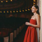 Sutton Foster Instagram - An unforgettable evening. 📷 by the amazing @jennyandersonphoto Sutton fashion credits — Style: @emilysanchezstyle Hair: @djquintero Makeup: @quinnmurphy Black gown: @michaelkors Shoes: @alexandrebirman Red dress: @oneof_ny Shoes: @alexandrebirman Red carpet look: Gown with roses: @markarian_nyc Shoes: @rogervivier Suit: @dereklam Shoes: @rogervivier All jewelry for Sutton: @tiffanyandco Cowboy look: Jeans: @everlane Shirt: @wrangler Boots: @crownvintagecompany @dsw #kelliohara #carnegiehall #nypops #suttonfoster #chums