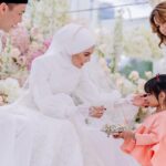 Sweet Qismina Instagram – Nikah day moments part 2 🌸
Just like how we imagined, a venue that has an all white base, full with blossom pink flowers & filled with our beautiful family members on our special day.
Tq @boathouse.my @flair.design for fulfilling our dreams 🌸
#TerciptaALSQ