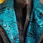 Tamina Instagram - Thank you @kyllacustomrockwear for making this Wrestlemania🏴‍☠️ jacket that went so great with my ring gear. I loved the the idea of how you can swap out the colors on the collar to match whatever gear I wear🖤🤙🏽🤩 That was hella genius! You always come up with great creative ideas and luv the imagination behind your work... IT is amazing! I truly appreciate your hard work and dedication to always making me something when needed. Even tho it was hella hot that night of Mania🤣 LOL I Still wore it😉😂😅 Thank you again Girl🖤❤️🤟🏽💙