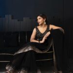 Tanya Chaudhari Instagram - Embracing the timeless allure of a black saree 🖤 . . . . Photography @faizialiphotography Makeup @makeup_asfaque Hair @sisodmanju Saree @meenabazaar . . . . #blacksaree #meenabazaar #sareelover #elegance #indiangirl #tanyachaudhari