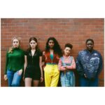 Tanya Reynolds Instagram - A photo i took of some legends on @sexeducation s2 probably this time last year sorry if the coolness breaks your phone. 🖤🧡💜💛💙💚❤ #nikonfm3a #filmphotography