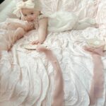 Tara Lipinski Instagram – My squirmy little munchkin. Taking these month milestone pics are proving to be more difficult every month. She is all over the place! It’s her little (big) cheeks for me. I could just eat her 🍰

#babypics #5monthsold #babygirl #babylove❤️ #girlmom #newbornbaby #babycheeks