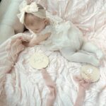 Tara Lipinski Instagram – My squirmy little munchkin. Taking these month milestone pics are proving to be more difficult every month. She is all over the place! It’s her little (big) cheeks for me. I could just eat her 🍰

#babypics #5monthsold #babygirl #babylove❤️ #girlmom #newbornbaby #babycheeks