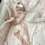 Tara Lipinski Instagram – My squirmy little munchkin. Taking these month milestone pics are proving to be more difficult every month. She is all over the place! It’s her little (big) cheeks for me. I could just eat her 🍰

#babypics #5monthsold #babygirl #babylove❤️ #girlmom #newbornbaby #babycheeks