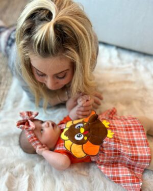 Tara Lipinski Instagram - I’ve never felt more GRATEFUL. EVER 🍁❤️

My heart is so full of gratitude and so thankful that this little nugget has entered our lives. Life with her is just dreamy. 

I love loving you @toddkap and can’t believe we created this little turkey. 🦃

#thanksgiving #myfirstthanksgiving #newborn #holidayswithbaby
