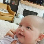 Tara Lipinski Instagram – Too cute not to share! WAIT TIL THE END FOR IT. She has been trying to mimic me as I stick out my tongue to her and she’s finally getting it! This little perfect nugget.
It was around this time last year when I had my retrieval and we made her! 🧬🐣
P.s I will need to post a baby pic of me but she certainly is getting my cheeks! Lol. I can’t help but squish them all the time. I love all the rolls!
#babyrolls #newborn #babygiggles #babysmilesarethebest #babysmiles