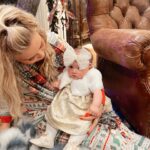 Tara Lipinski Instagram – Merry Christmas! I hope you all have an amazing one! 🎄
This holiday season I am just soaking up the moments that make life good. For me it’s about Georgie, my Tk, family and friends. When it comes down to it, it’s all about good health and good people to love.
It’s been magical with Gigi but life still happens. A lot has happened with my family and life in the last 6 months. Some absolutely incredible and some not so great. So for every cute baby pic I post, know that life happens to everyone even in the most amazing of times. (Although I take the joy out of those insta moments too that capture some magical memories)
Most recently, my dad ended up in the hospital for a few days and got out right in time for Christmas Eve. He gave me quite a scare but he is totally fine. Finally found out it was kidney stones but boy was that wait not fun. (My mom came through with the most magical Christmas Eve where I just was so happy to be with them.) My Uncle Phil is on hospice and I wish I was able to see him and his family 😢 Plus a long little list continues that. But for all the hard things there is A LOT of good things!
I also feel for everyone out there wishing for a baby this Christmas morning. I see you and I know your pain and remember my last five years of waking up wishing too. That pain is not fun so know I am rooting for you and I hope your next Christmas is filled with baby giggles. You deserve it.
So that was just my emotional holiday post to say I am so grateful for the people in my little world and for all you and your support!
#newborn #3monthsold #babysfirstchristmas #newbornbabychristmas #babychristmasphotos #babychristmasoutfits