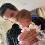Tara Lipinski Instagram - Georgie’s first Easter and too many pics to count. Some of the ones that didn’t make stories. 🐰🥕 Our little family. 🫶 Hoping Sully thought the Easter basket was for him. Little man is so good with her, he just wants *needs* to part of everything. #easter #babysfirsteaster #babygirl #baby #6monthsold #parenting #babyanddog