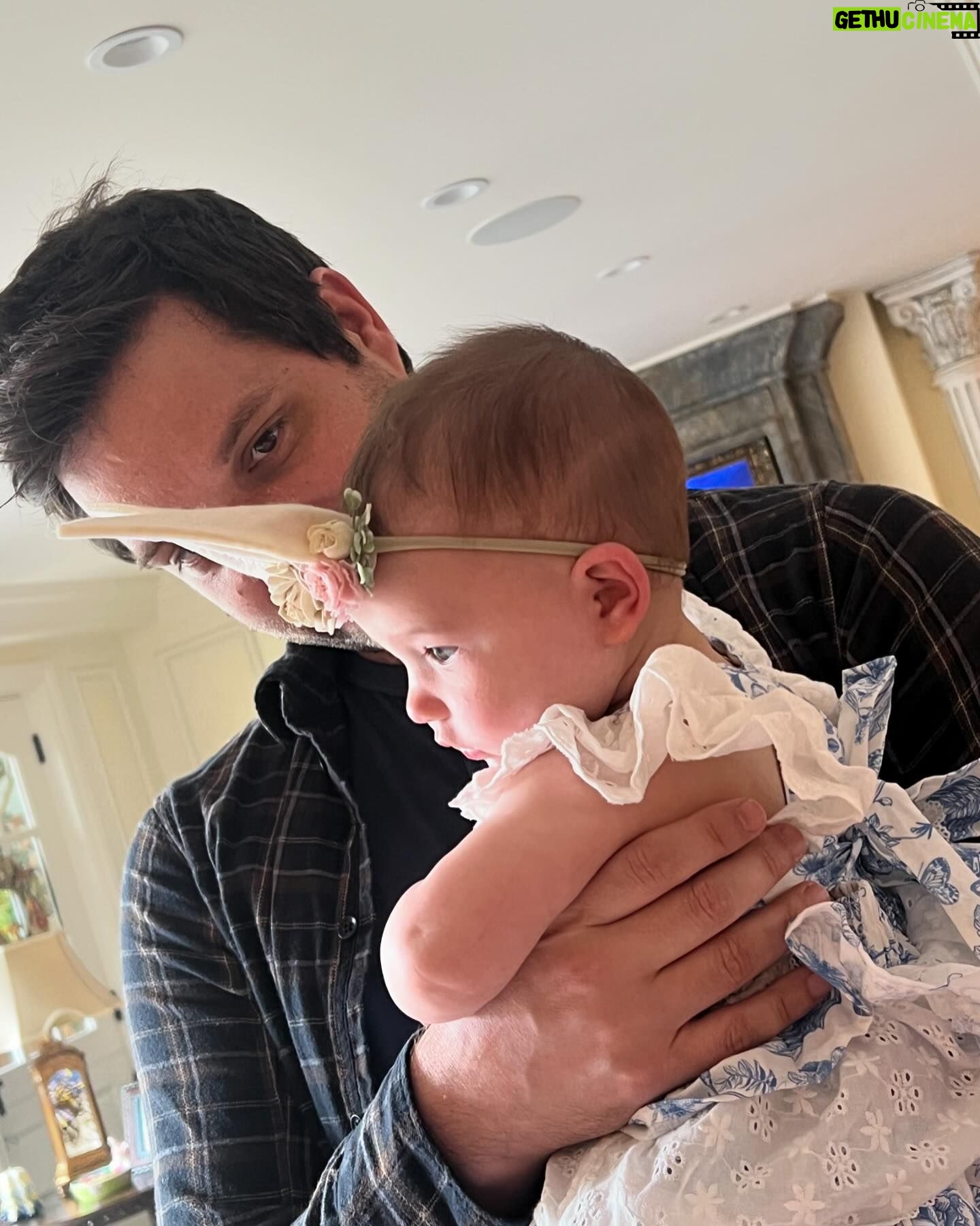 Tara Lipinski Instagram - Georgie’s first Easter and too many pics to count. Some of the ones that didn’t make stories. 🐰🥕 Our little family. 🫶 Hoping Sully thought the Easter basket was for him. Little man is so good with her, he just wants *needs* to part of everything. #easter #babysfirsteaster #babygirl #baby #6monthsold #parenting #babyanddog