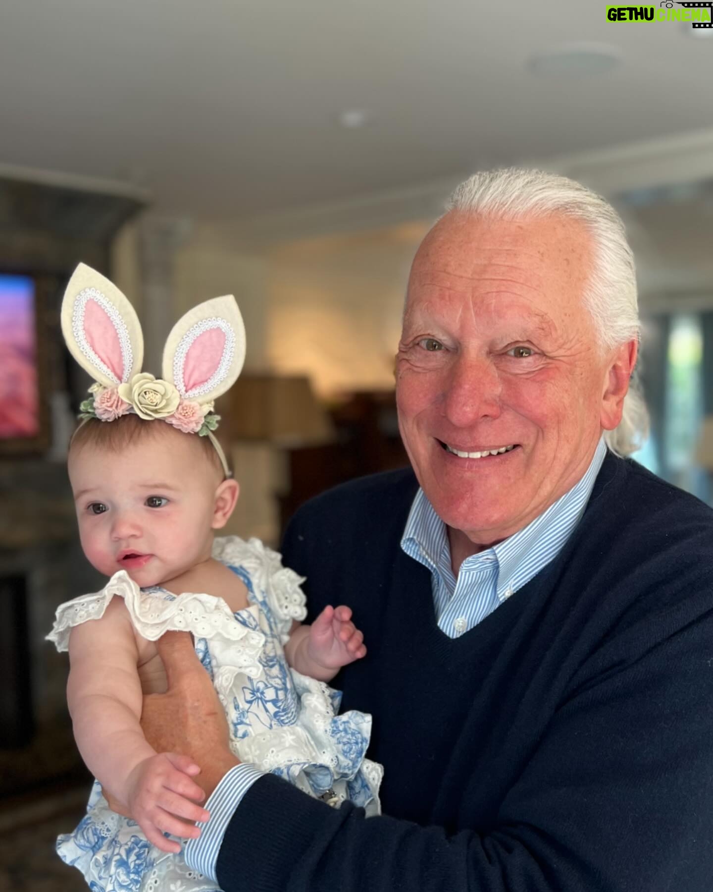 Tara Lipinski Instagram - Georgie’s first Easter and too many pics to count. Some of the ones that didn’t make stories. 🐰🥕 Our little family. 🫶 Hoping Sully thought the Easter basket was for him. Little man is so good with her, he just wants *needs* to part of everything. #easter #babysfirsteaster #babygirl #baby #6monthsold #parenting #babyanddog