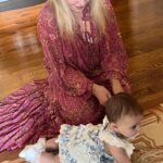 Tara Lipinski Instagram - Georgie’s first Easter and too many pics to count. Some of the ones that didn’t make stories. 🐰🥕 Our little family. 🫶 Hoping Sully thought the Easter basket was for him. Little man is so good with her, he just wants *needs* to part of everything. #easter #babysfirsteaster #babygirl #baby #6monthsold #parenting #babyanddog