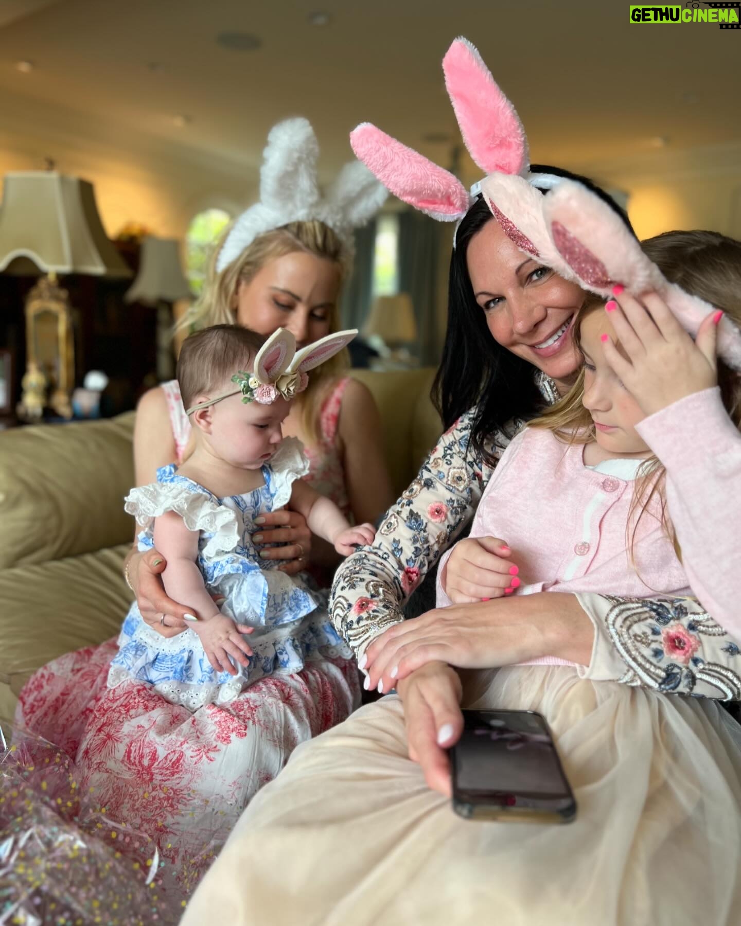Tara Lipinski Instagram - Georgie’s first Easter and too many pics to count. Some of the ones that didn’t make stories. 🐰🥕 Our little family. 🫶 Hoping Sully thought the Easter basket was for him. Little man is so good with her, he just wants *needs* to part of everything. #easter #babysfirsteaster #babygirl #baby #6monthsold #parenting #babyanddog